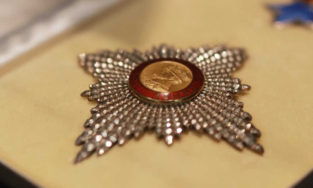 Gibbs' Knight of the British Empire medal awarded in 1970.