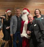Santa (aka Barrister Ross McSwan) with Axia Litigation Lawyers staff at the Sunshine Coast Law Association Christmas Party.